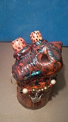 Oscar. Sea Monster Charm. A unique, one of a kind, hand sculptured gift. I love my swirly colors of brown and teal. I have a little monster in me sometimes LOL!