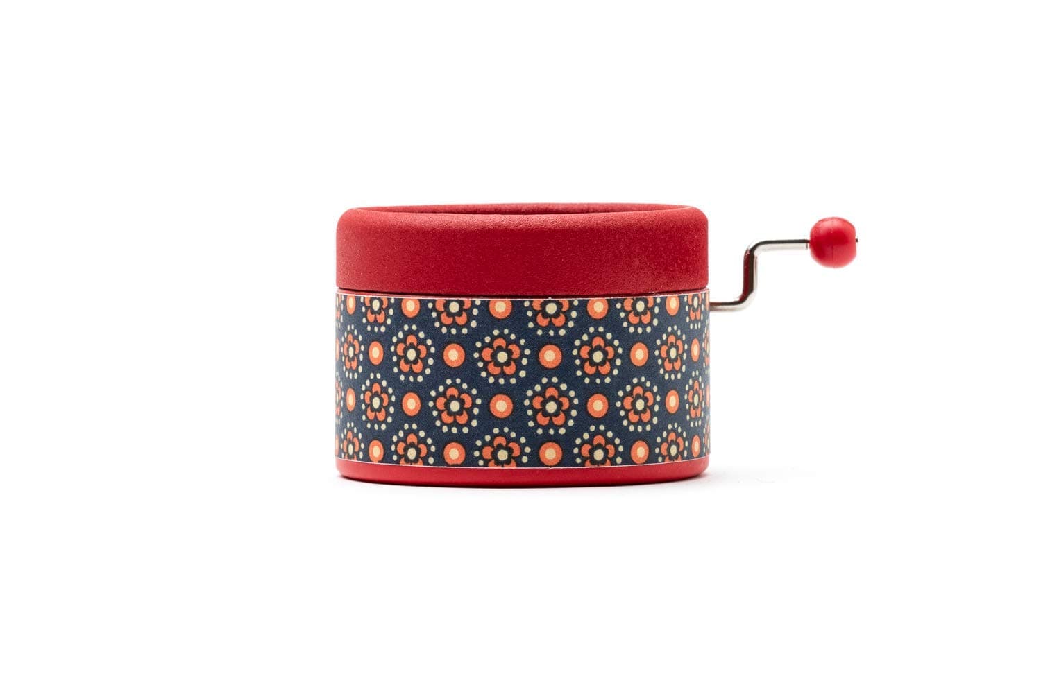 Esdemusica by Rocío hand made red music box with a blue and orange pattern. Exclusive design and a hand crank mechanism with the classic melody by Pachelbel. 1,9 inch x 1,5 inch high