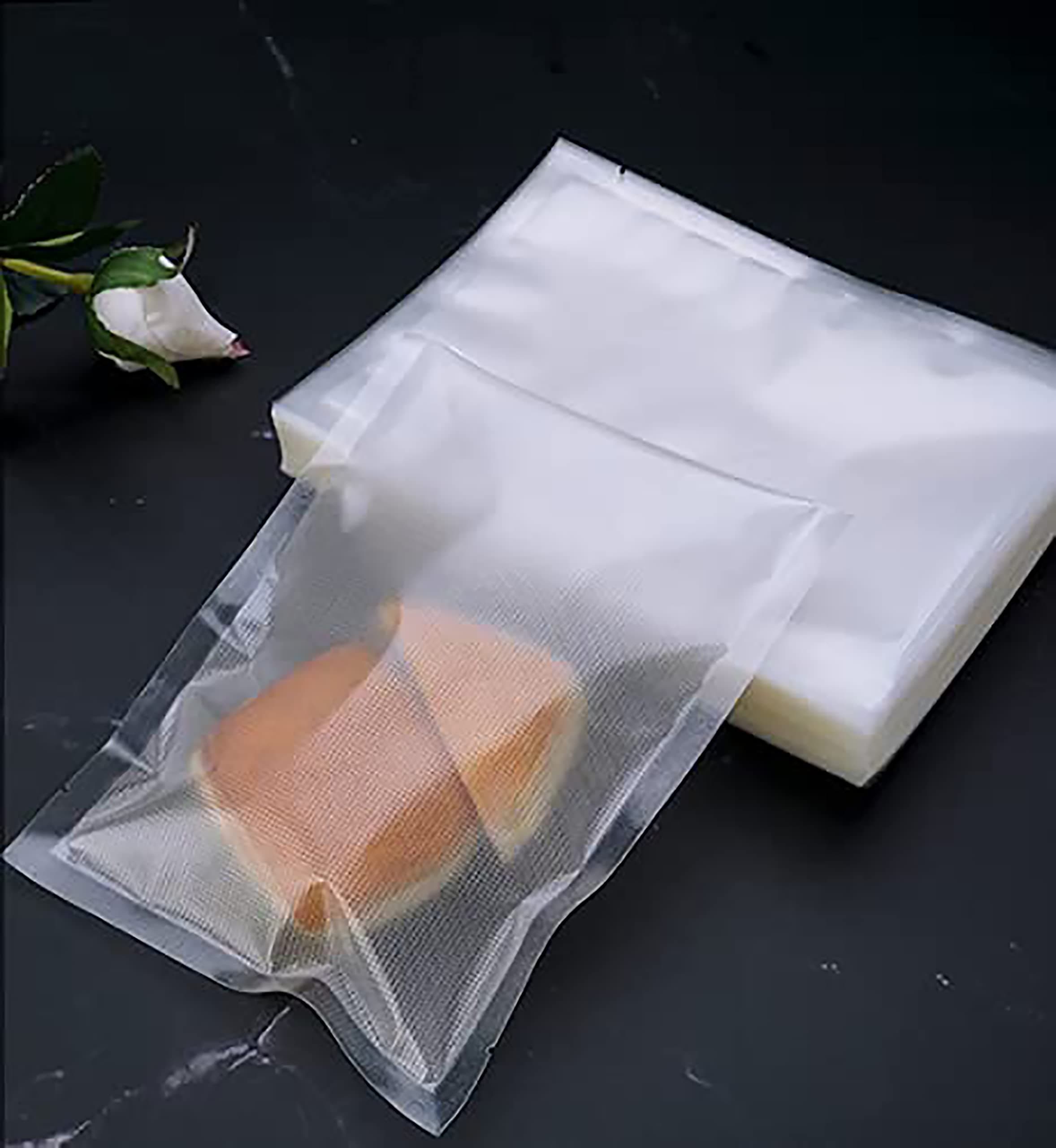 Nyganmelloz 100pcs Vacuum Sealer bags (Size 6.3 * 9.5 inch) - Food Storage Saver Bags, Clear, Sous Vide/Microwaveable/Fridgeable/Keep fresh