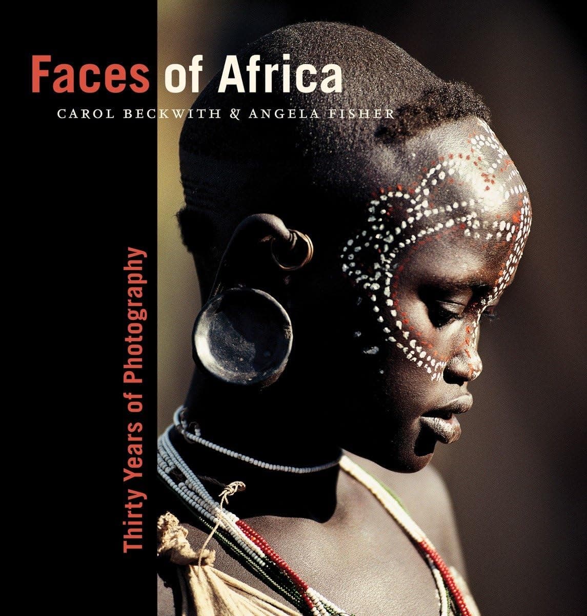 FACES OF AFRICA Hardcover – 6 January 2009