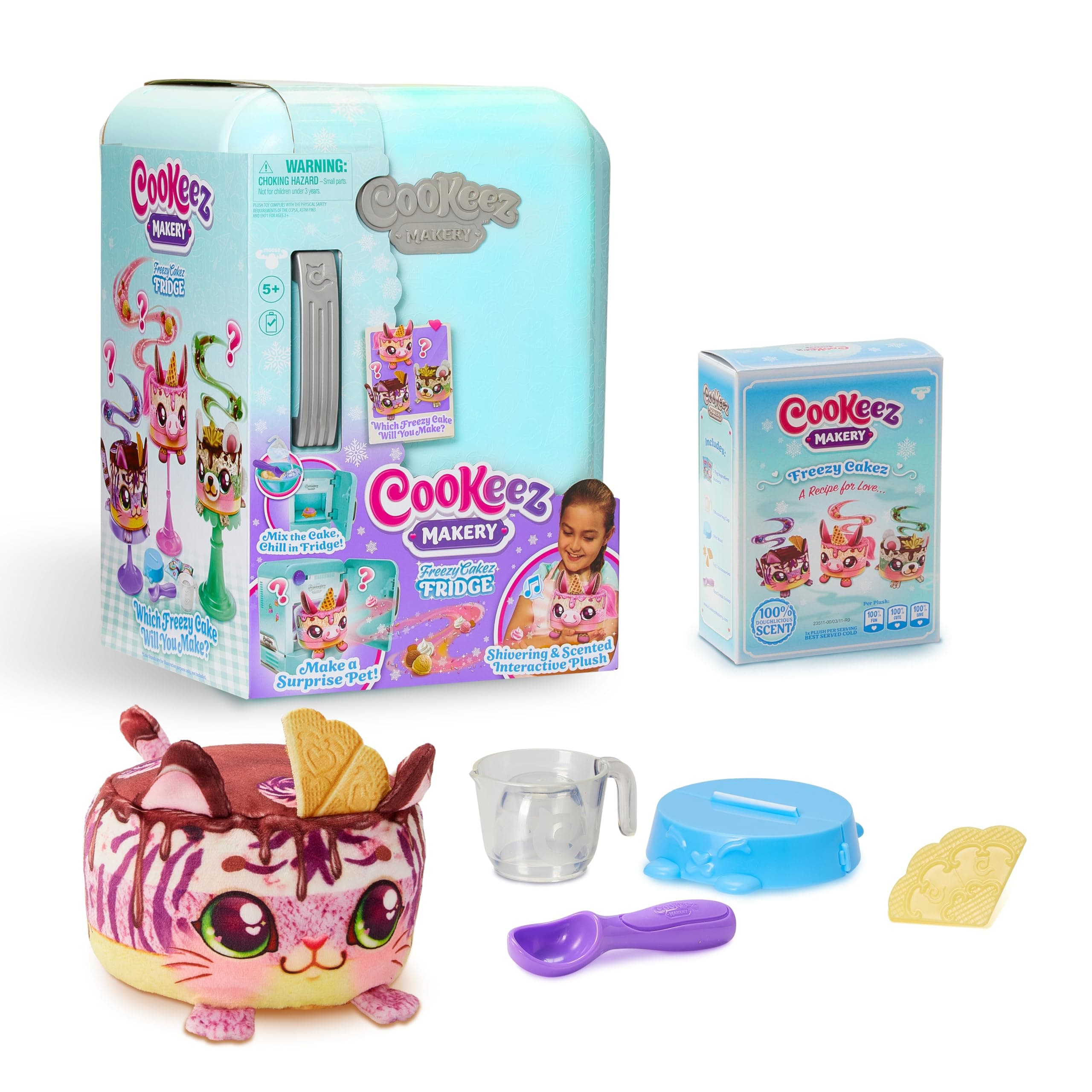 Cookeez Makery Freezy Cakez Fridge, Freezy Cakez. Mix & Decorate Your Plush Best Friend! Place Your Cake Mix in The Freeze and Be Amazed When A Scented, Shivering, Interactive Plush Friend Comes Out