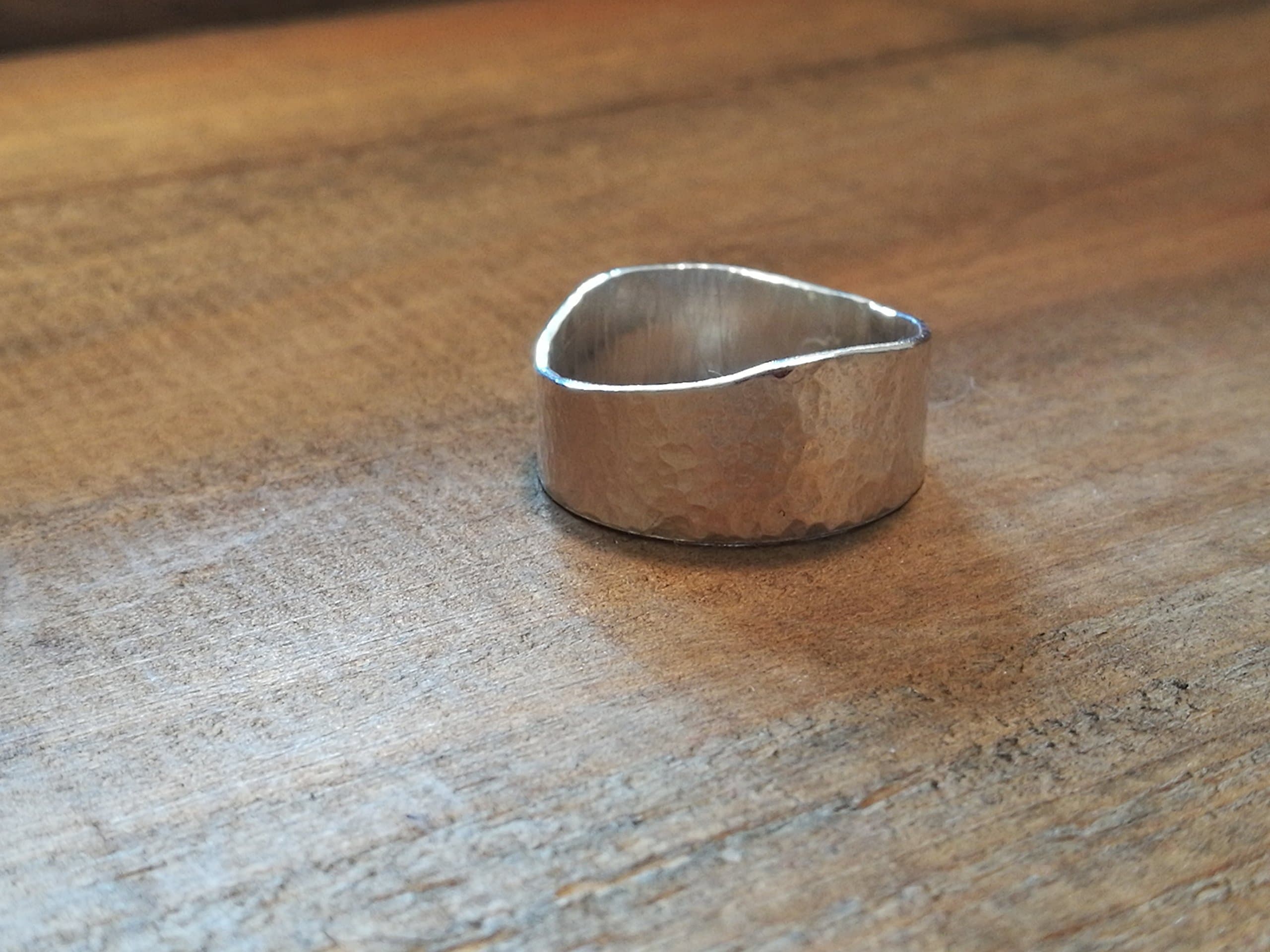 Wave sterling silver band ring, hammer textured.