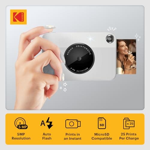 Kodak Printomatic Instant Camera (Grey) Gift Bundle + Zink Paper (20 Sheets) + Deluxe Case + 7 Fun Sticker Sets + Twin Tip Markers + Photo Album + Hanging Frames + Comfortable Neck Strap