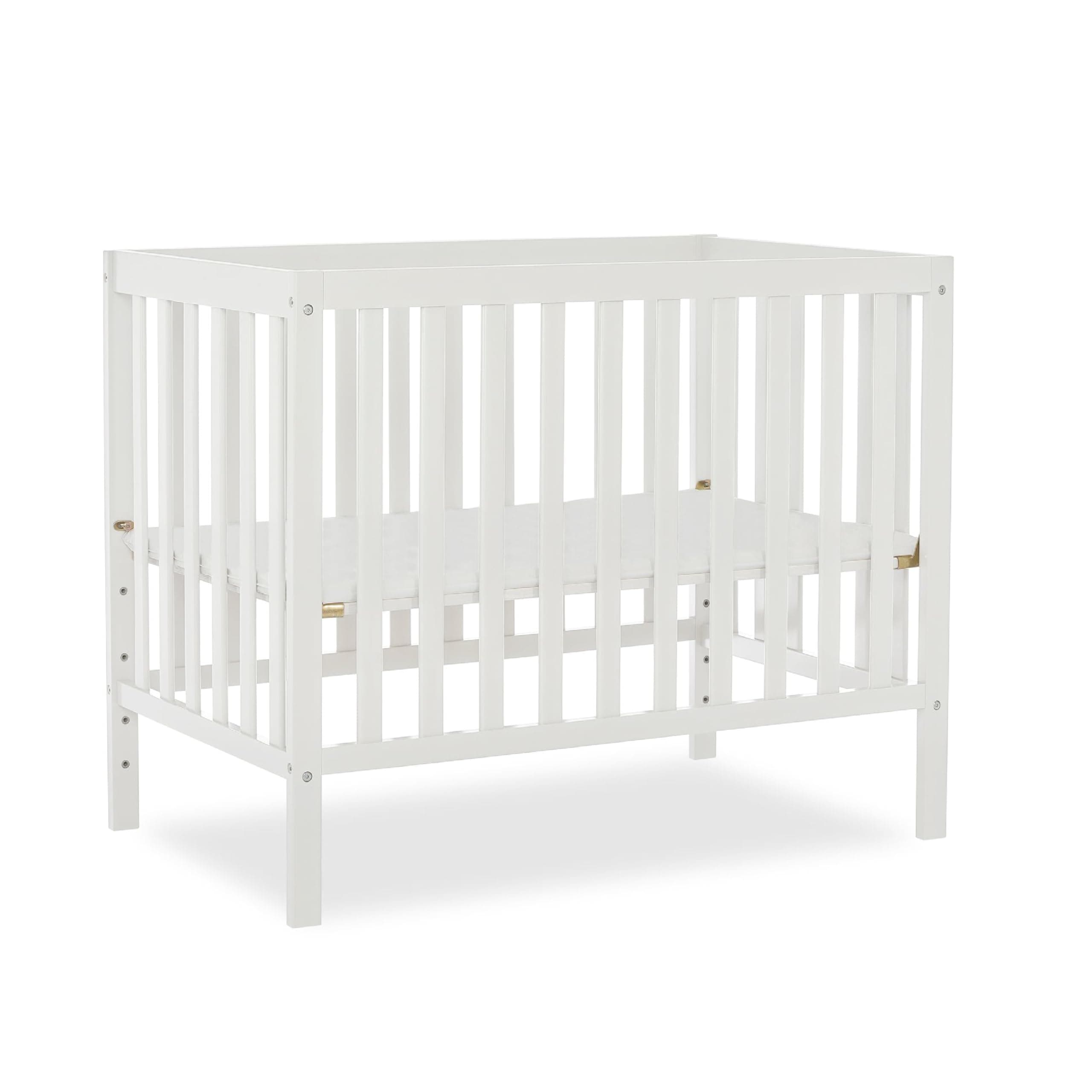 Edgewood 4-in-1 Convertible Mini Baby Crib in White GreenGuard Gold & BSA, Non-Toxic, Compact 40×25×33″ Design, Converts to Mini Daybed & Twin Bed (Rails to Buy) 1″ Mattress Pad