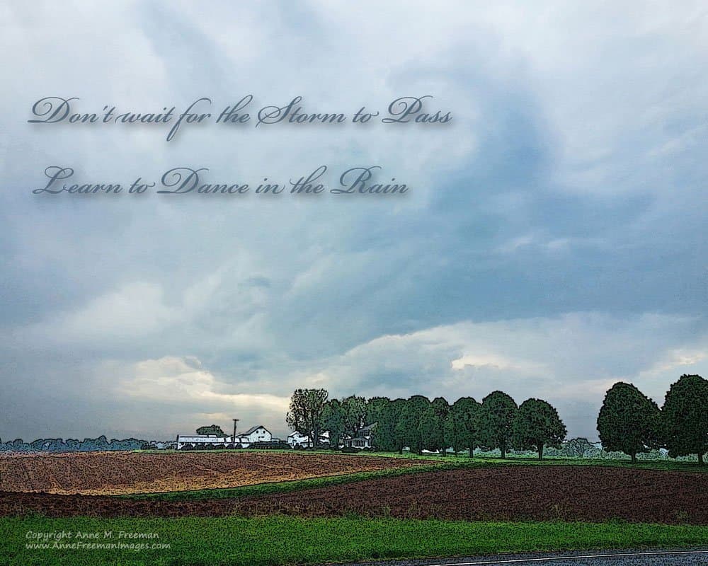 Dance in the Rain. A fine art photograph of a farm with thunderheads with the saying,"Don't wait for the Storm to Pass, Learn to Dance in the Rain."