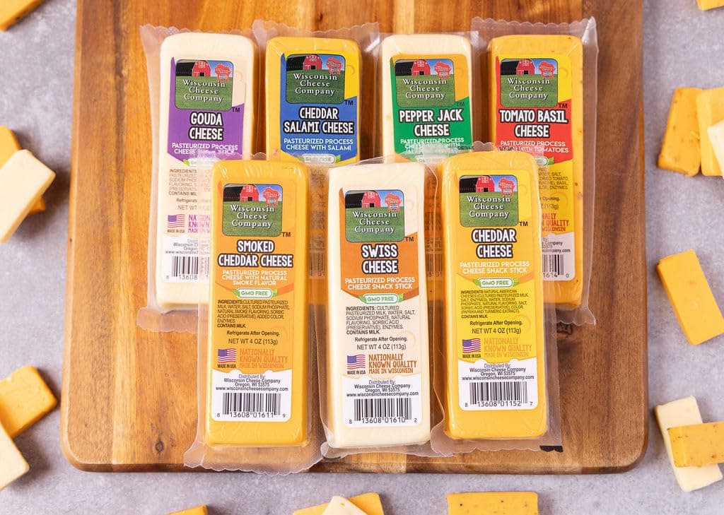 WISCONSIN CHEESE COMPANY - Specialty 100% Wisconsin Cheese Block Assortment Sampler - (Pack of 7 Blocks) Cheddar, Pepper Jack, Swiss, Gouda, Cheddar Salami, Smoked Cheddar & Tomato Basil Cheese,Perfe